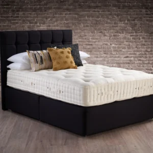 A detailed product description for the Hypnos Wool Origins 8 mattress. It highlights the mattress's generous wool content, ReActiveProโข spring system with Adaptivโข comfort springs, and double-sided design, along with dimensions, weight, and a 10-year guarantee.