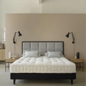 A detailed product description for the Hypnos Cotton Origins 8 mattress. It highlights the mattress's generous cotton and wool content, ReActivePro™ spring system, and sustainable design, along with dimensions, weight, and a 10-year guarantee.