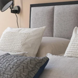 A detailed product description for the Hypnos Cotton Origins 8 mattress. It highlights the mattress's generous cotton and wool content, ReActivePro™ spring system, and sustainable design, along with dimensions, weight, and a 10-year guarantee.