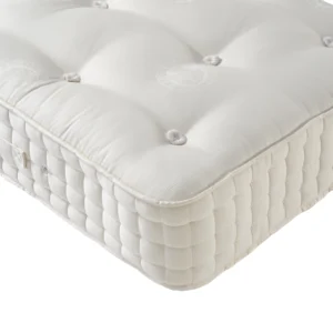 A detailed product description for the Hypnos Luxury No Turn 9 mattress. It highlights the mattress's three layers of natural latex, ReActivePro™ 9-turn pocket spring system, and double-sided design, along with dimensions, weight, and a 10-year guarantee.
