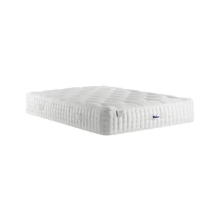 A detailed product image showing the internal layers of the Luxury Alpaca 2550 mattress, including the pocket springs and natural alpaca-wool layers. The image also displays the full mattress on a divan base in a bedroom setting, highlighting its hand-tufted finish and a tag with "10" indicating a 10-year warranty.