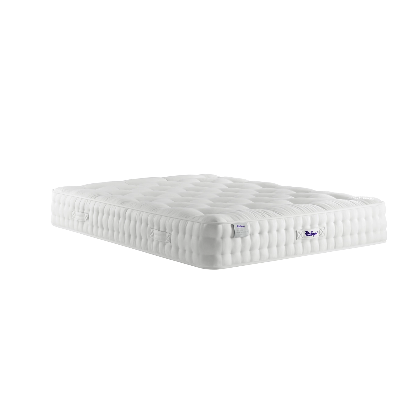 A detailed product image showing the internal layers of the Luxury Wool 2150 mattress, including the pocket springs and wool layers. The image also displays the full mattress on a divan base in a bedroom setting, highlighting its hand-tufted finish and a tag with "10" indicating a 10-year warranty.
