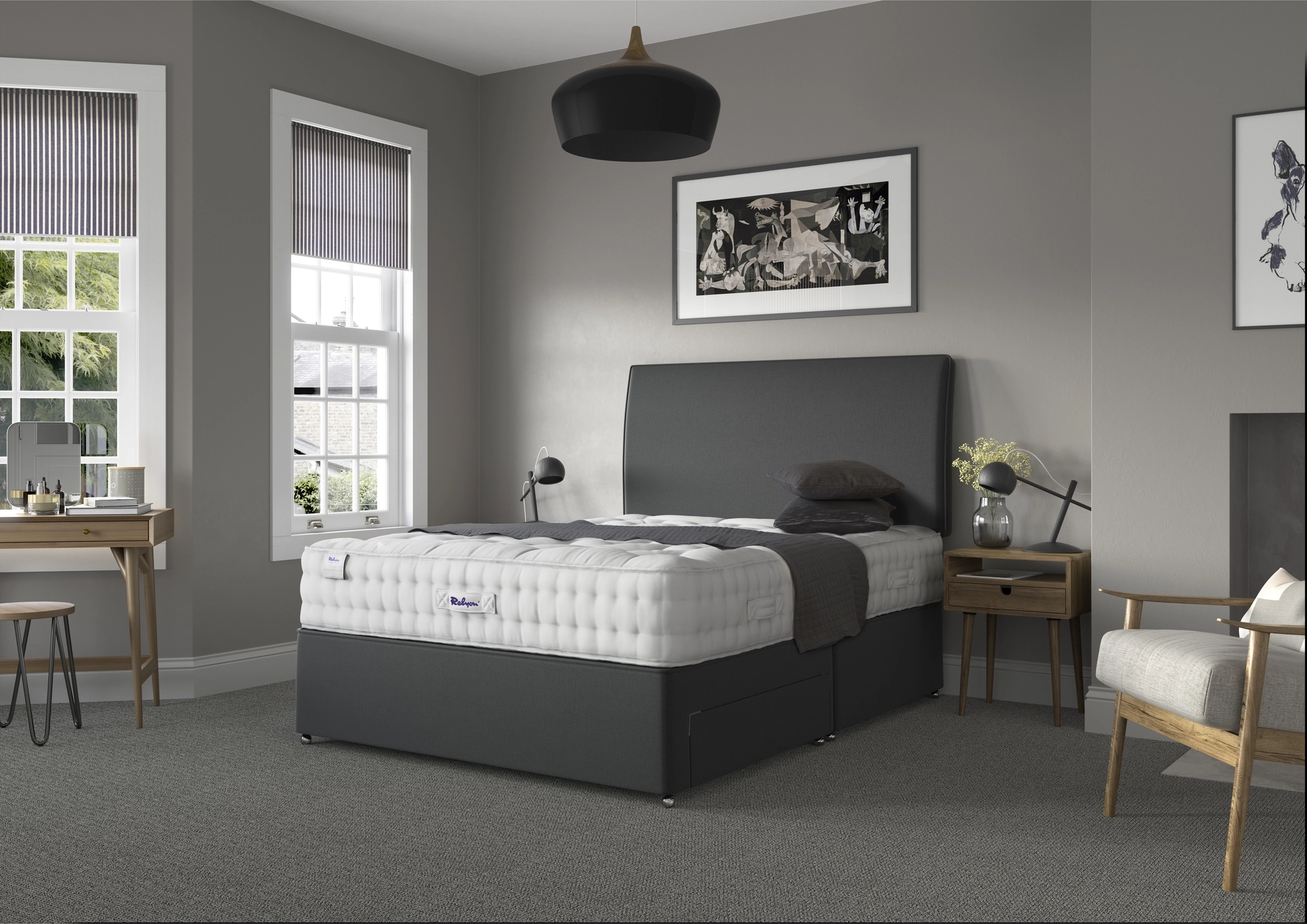 A detailed product image showing the internal layers of the Luxury Wool 2150 mattress, including the pocket springs and wool layers. The image also displays the full mattress on a divan base in a bedroom setting, highlighting its hand-tufted finish and a tag with "10" indicating a 10-year warranty.