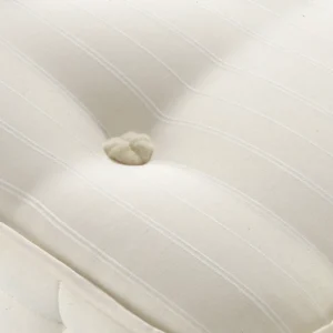 Hypnos Cotton Origins 6 mattress datasheet showing a cross-section of its internal layers and a full product shot on a divan base