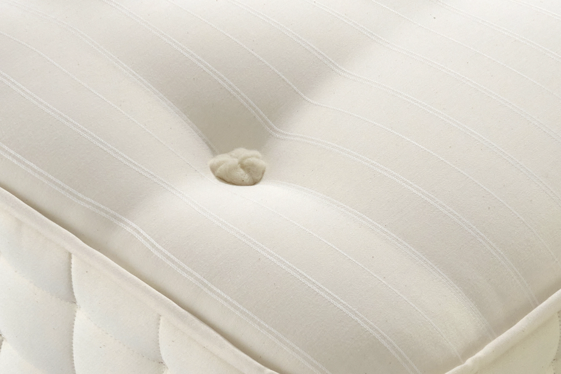 Hypnos Cotton Origins 6 mattress datasheet showing a cross-section of its internal layers and a full product shot on a divan base