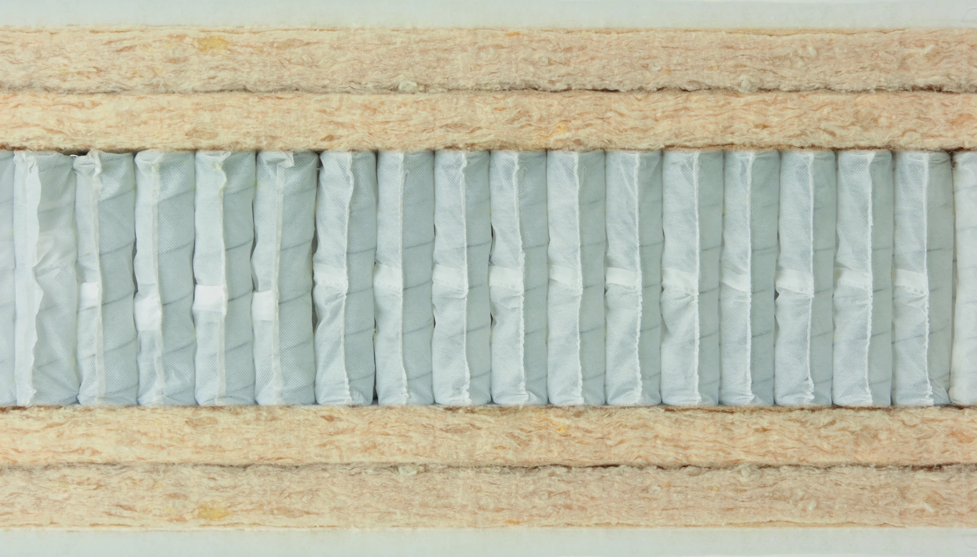 Hypnos Cotton Origins 6 mattress datasheet showing a cross-section of its internal layers and a full product shot on a divan base
