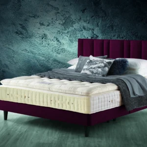 A visually detailed product description for the Hypnos Pillow Top Elite mattress, featuring a list of its high-quality natural and sustainable fillings, a 10-year guarantee, and tables for dimensions and weight. The description highlights the mattress's plush pillow top and ReActivePro™ spring system.