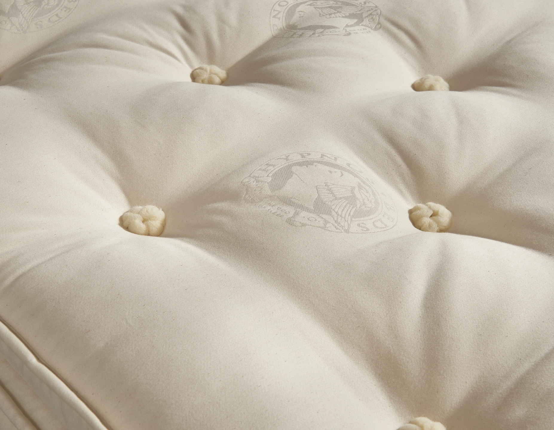 A visually detailed product description for the Hypnos Pillow Top Select mattress, featuring a list of its high-quality natural and sustainable fillings, a 10-year guarantee, and tables for dimensions and weight. The description highlights the mattress's plush pillow top and ReActiveProβ’ spring system.