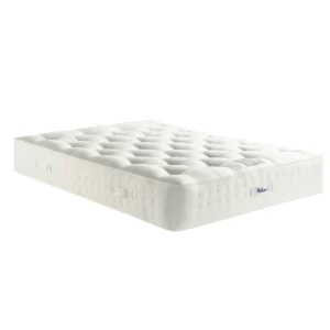 A detailed product image showing the internal layers of the Natural Luxury 1400 Deluxe mattress, including the pocket springs, foam, and natural fillings. The image also displays the full mattress on a divan base in a bedroom setting, highlighting its elegant finish and a tag with "10" indicating a 10-year warranty.