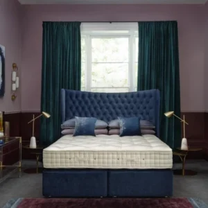 A visually detailed product description for the Hypnos Wool Origins 10 mattress, featuring a list of its high-quality natural fillings, a 10-year guarantee, and tables for dimensions and weight. The description highlights the mattress's generous wool content, ReActiveProβ’ spring system, and double-sided design.