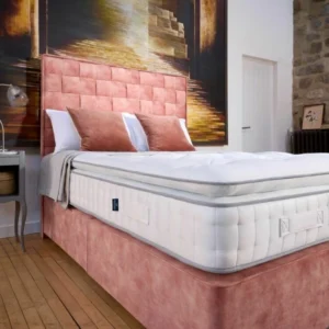 A screenshot of the Harrison Spinks Asscher Pillowtop 11,000 mattress product page. The images show a full mattress on a pink divan base, a close-up of the mattress's quilting, and a list of key features including 11,000 springs and natural fillings.