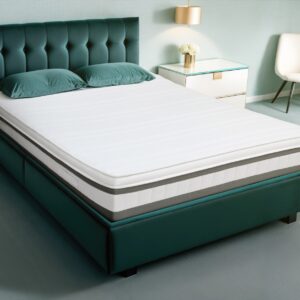 A screenshot of the Breasley Uno Exclusive Majestic Grand mattress product page. The page shows a full-size mattress and highlights key features such as a 5-year guarantee, CertiPUR-EU foam, and its luxury dual-spring system.