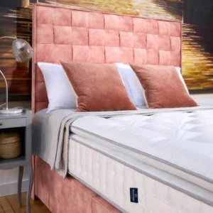 A screenshot of the Harrison Spinks Asscher Pillowtop 11,000 mattress product page. The images show a full mattress on a pink divan base, a close-up of the mattress's quilting, and a list of key features including 11,000 springs and natural fillings.