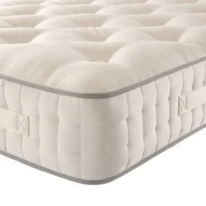 A screenshot of the Harrison Spinks Jade 10,000 mattress product page. The images show a full mattress on a green divan base, a close-up of the mattress's quilting, and a list of key features including 10,000 springs and natural fillings.