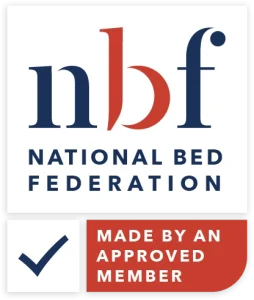 A screenshot of the Breasley Uno EcoBrease Active 1000 Firm mattress product page. The page shows a full-size mattress on a white divan base with a headboard. It highlights key features such as a 5-year guarantee, CertiPUR-EU foam, and its medium-to-firm feel.