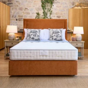 A screenshot of the Harrison Spinks Bronze Ortho 3,500 mattress product page. The images show a full mattress on a brown divan base, a close-up of the mattress's quilting, and a list of key features including 3,500 springs and natural fillings.