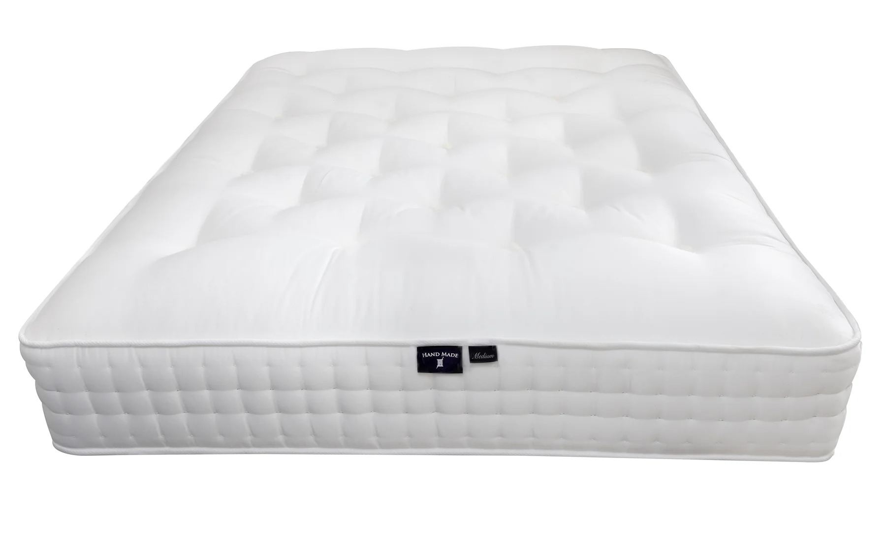 A full shot of the Natural 5000 Pocket Sprung Mattress, showing its thick profile, hand-tufted finish, and luxurious white quilted fabric. Small thumbnails show a detail shot and the side with stitched handles.