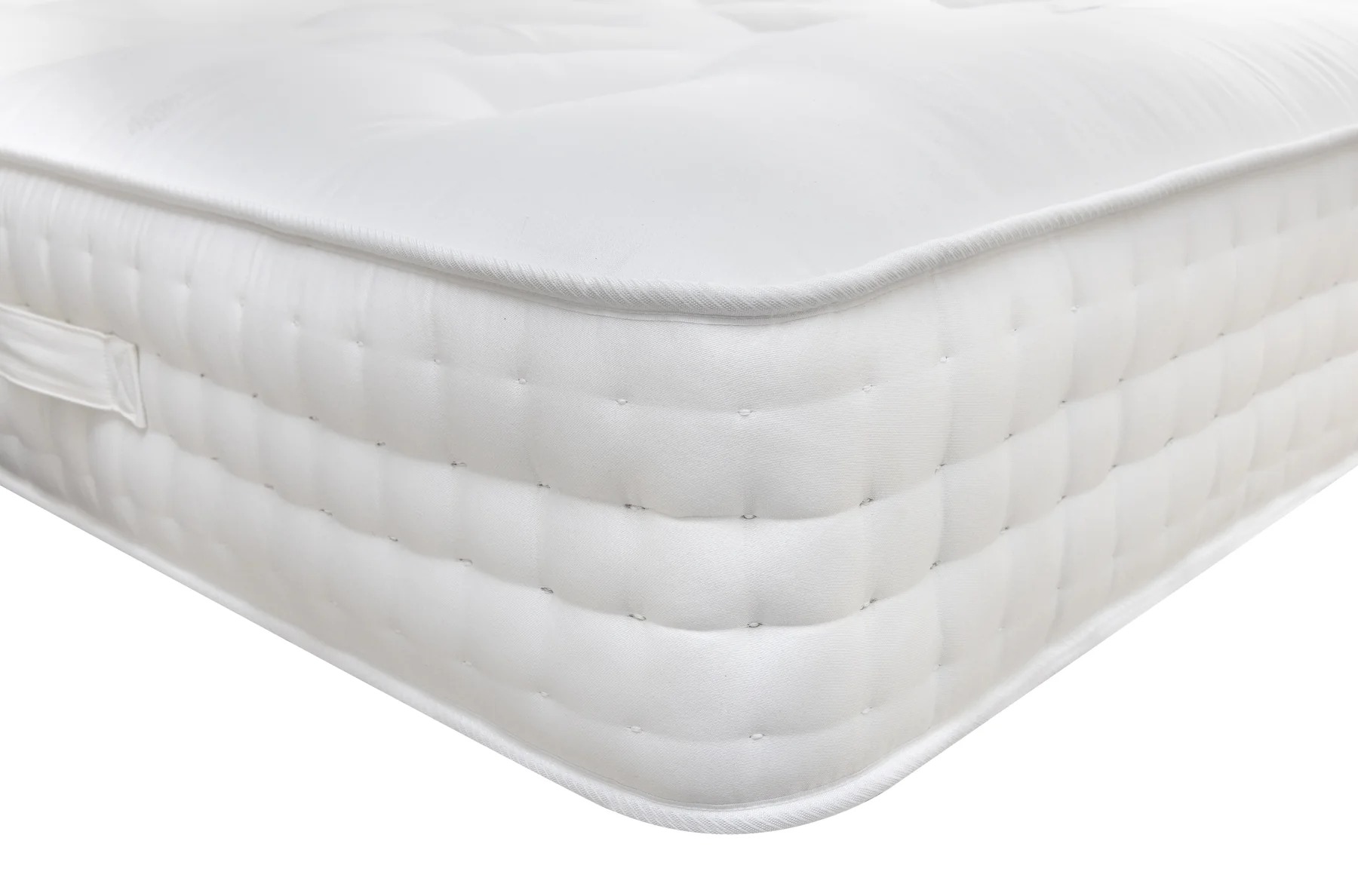 A full shot of the Natural 5000 Pocket Sprung Mattress, showing its thick profile, hand-tufted finish, and luxurious white quilted fabric. Small thumbnails show a detail shot and the side with stitched handles.