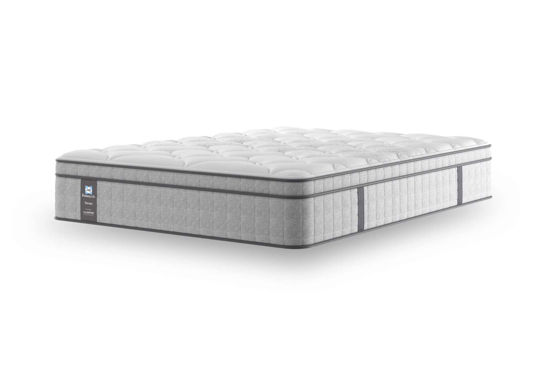 A full shot of the Spencer Plush Mattress, shown on a dark blue divan base with a tall, contemporary upholstered headboard, set in a bright bedroom with light wood wall panelling. The mattress has a deep quilted white top.