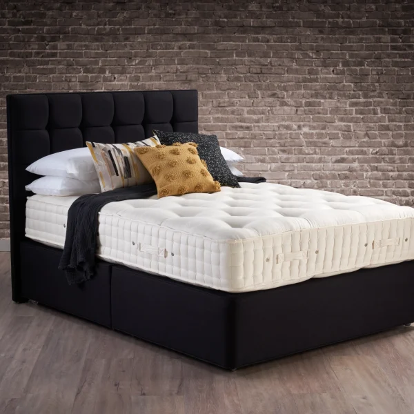 A detailed product description for the Hypnos Wool Origins 8 mattress. It highlights the mattress's generous wool content, ReActivePro™ spring system with Adaptiv™ comfort springs, and double-sided design, along with dimensions, weight, and a 10-year guarantee.
