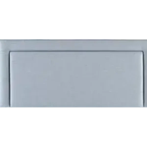 A deeply-cushioned headboard with a prominent central panel surrounded by a heavily padded border. The headboard is in a light, neutral-colored fabric and is shown against a plain grey background.