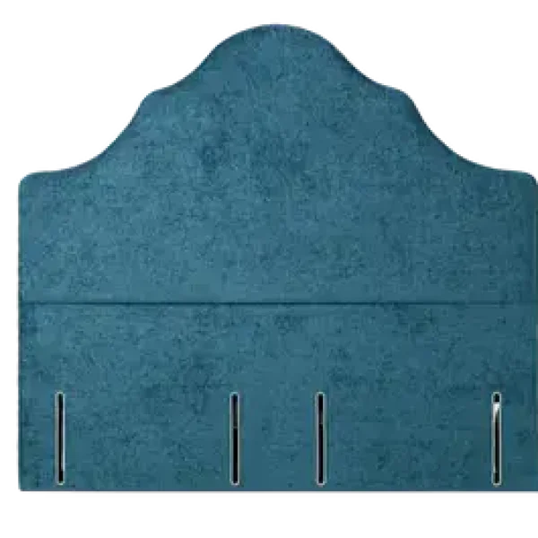 A tall, euro-slim headboard with bold, sweeping curves, shown in a dark blue upholstered fabric. The headboard is shown against a plain grey background.
