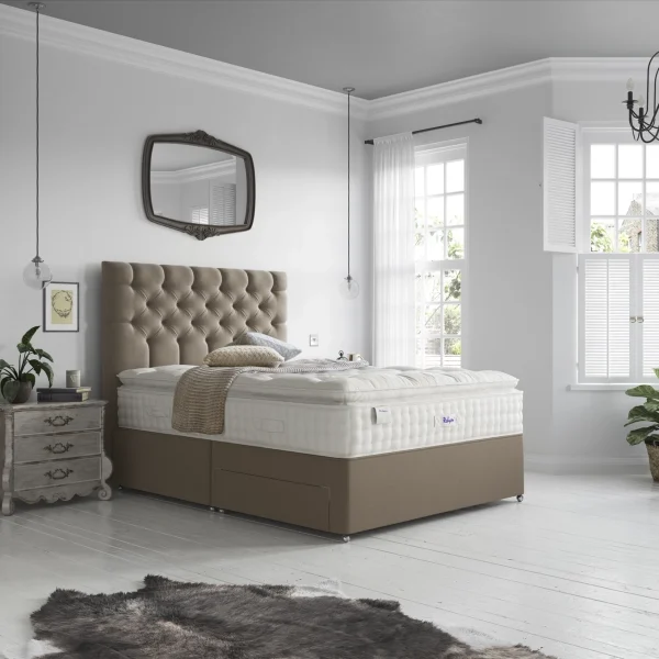 A detailed product image showing the internal layers of the Luxury Silk 2850 mattress, including the pocket springs, pillowtop layer with mini pocket springs, and silk-cashmere fillings. The image also displays the full mattress on a divan base in a bedroom setting, highlighting its elegant finish and a tag with "10" indicating a 10-year warranty.