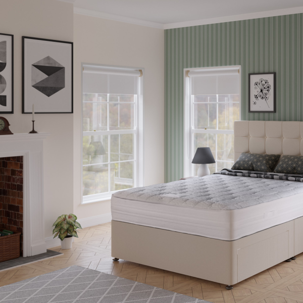 A close-up product image of the Superior Hybrid mattress, showing its soft quilted finish and diamond pattern. The fabric is a light, elegant colour, highlighting its premium quality and design.