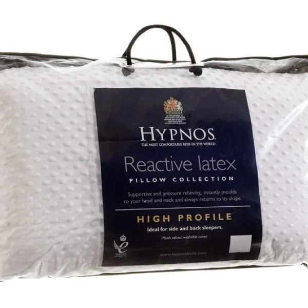 A high-profile latex pillow in a clear plastic bag with the Hypnos branding, shown against a white background. The image highlights the pillow's shape and a label with the product name.
