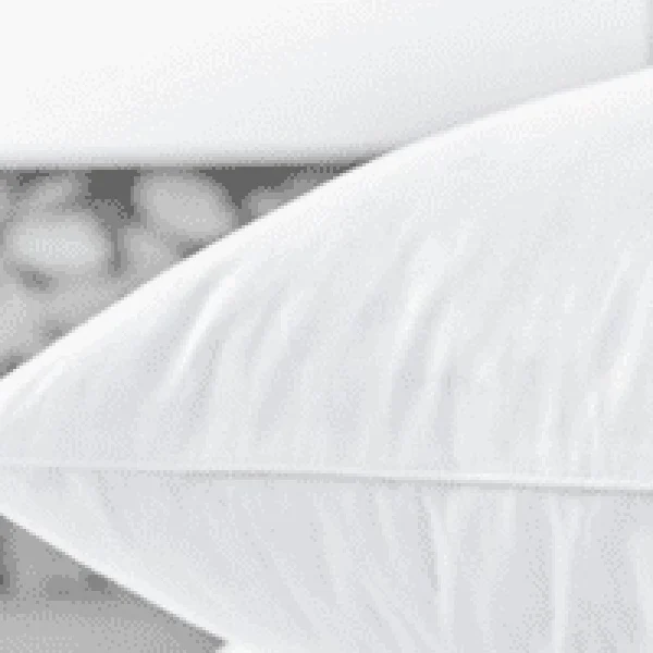 A close-up image of a white, plush Feather & Down Pillow, highlighting its soft and supportive texture.